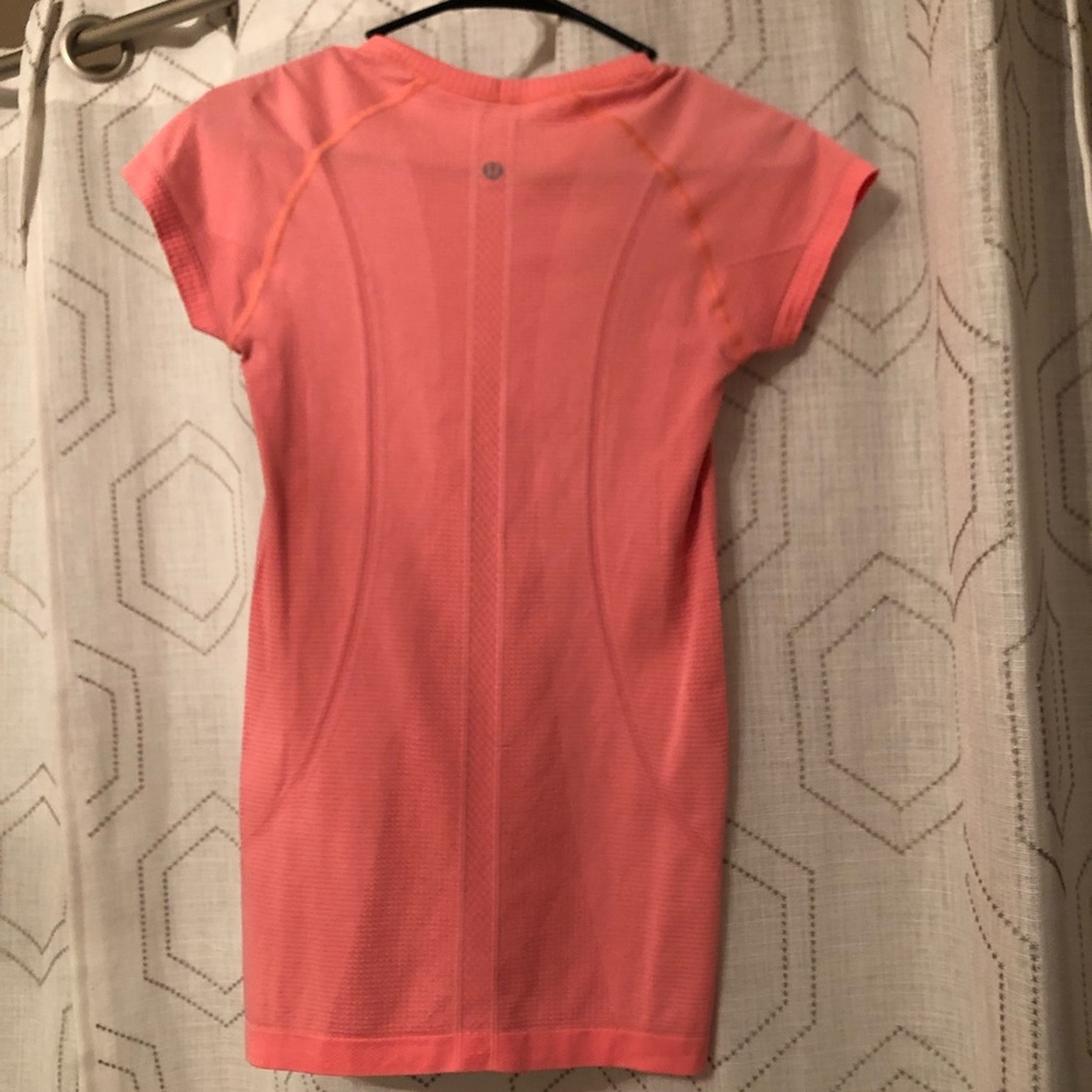 Peach lululemon shirt